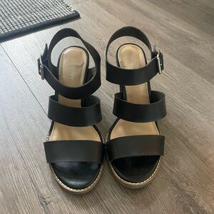 Open toed black heels